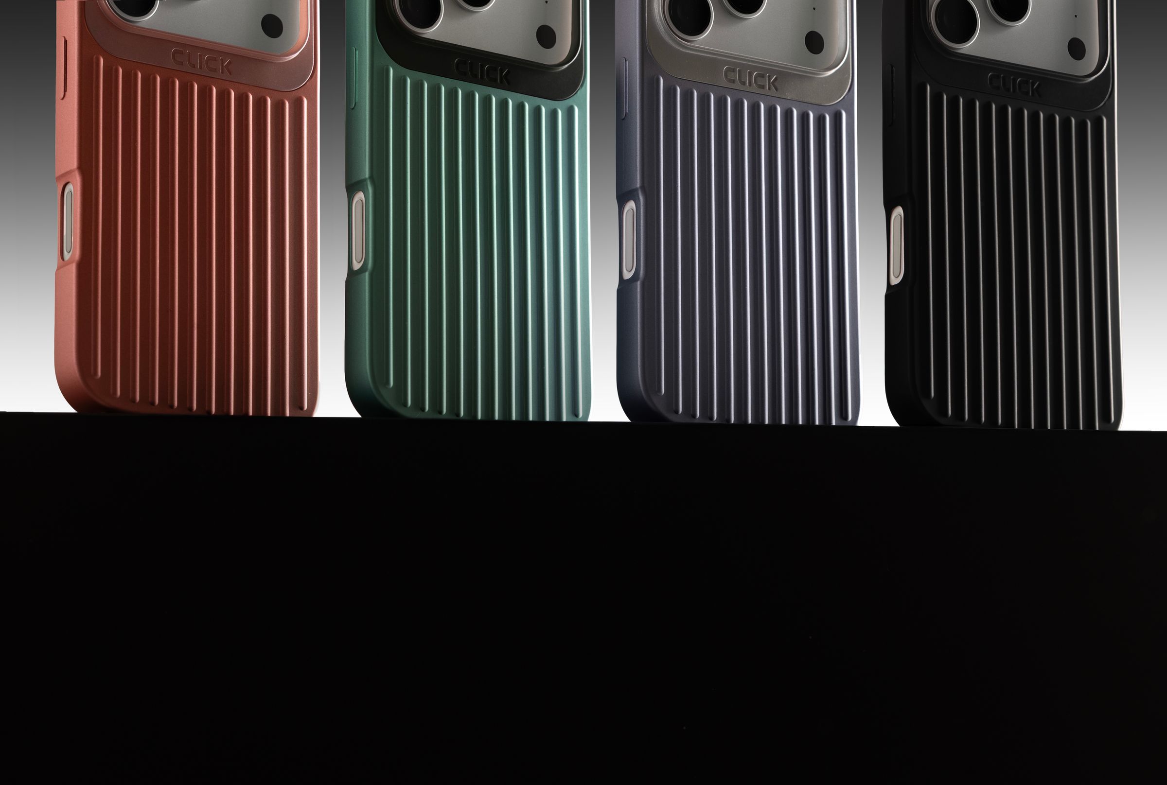 Four CLICK Nova cases standing in a row — clay, sage, lavender and black — cropped close on their ribbed backs